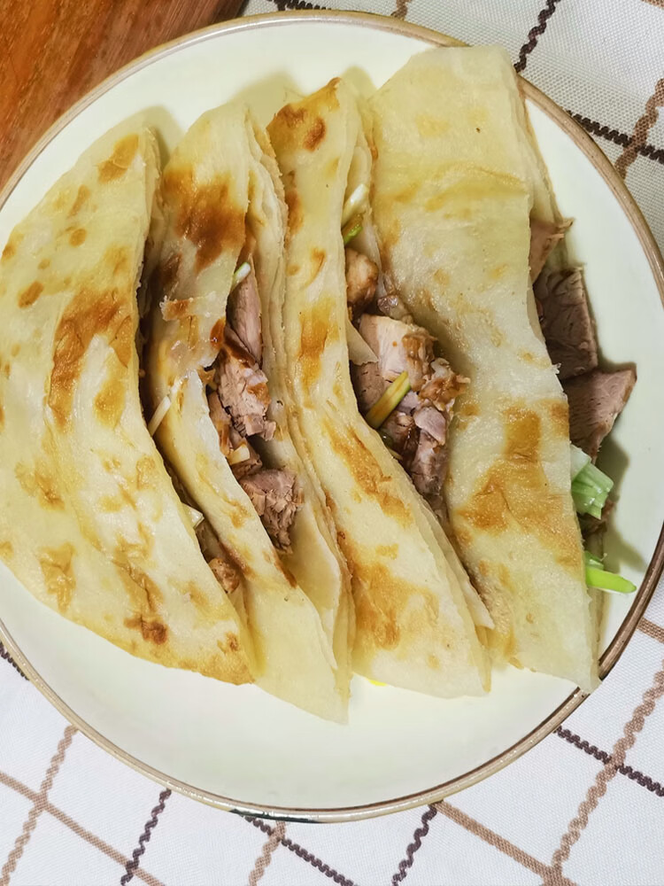 李连贵熏肉大饼半斤肉 四平特色 小吃面食美食 李连贵熏肉大饼 早餐五