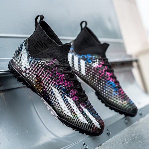 Wejiesess zapatillas de fútbol alta para hombres y mujeres TF uñas rotas para adultos y adolescentes y estudiantes competiciones infantiles para personas y concursos de entrenamiento de hierba para zapatos para mandarín pato plateado negro + luna blanca uñas rotas 42 [calcetines y bolsa de zapatos]