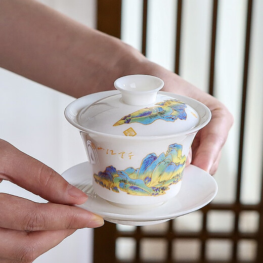 Three more than nine such as Kung Fu tea set complete gift box to give away mutton-fat jade tea set high-end travel tea tray teacup cover bowl integrated mutton-fat jade tea set blue leather bag