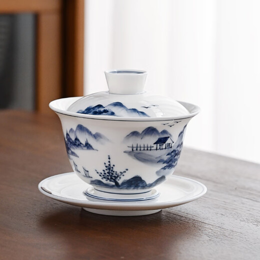 Gold-inlaid jade covered bowl tea set Kung Fu teacup set mutton-fat jade ceramic hand-painted landscape household simple three pieces close to mountains and rivers