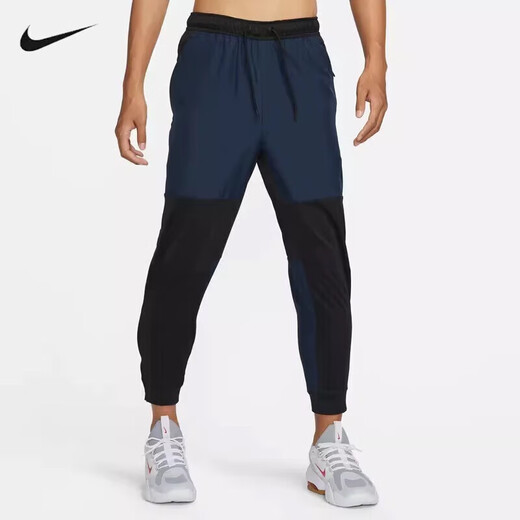 耐克（NIKE）运动裤男裤春秋季新款休闲裤梭织保暖宽松小脚裤长裤FB8602-084 FB8602-010黑蓝拼接 L