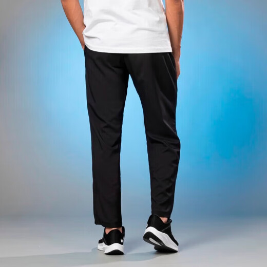 Nike (Nike) Pantalones de hombres oficiales 2025 Pantalones deportivos Nuevos pantalones de secado rápido de moda transpirable Moda de moda suelta DM6627-010 XL [180-185cm/150-160Jin [Jin iguala 0.5 kg]]