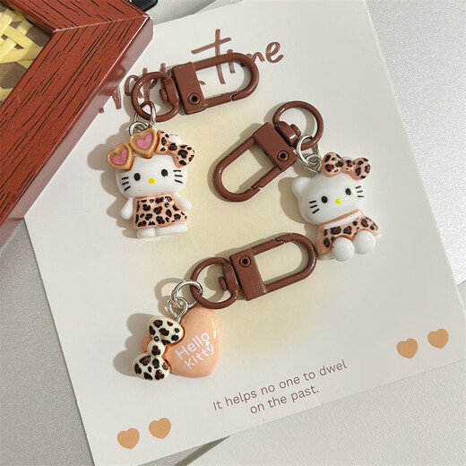 
Leopard print cartoon KT keychain brown autumn and winter retro cat school bag pendant ins style sweet cool hanging decoration cute glasses sitting-light leopard print KT