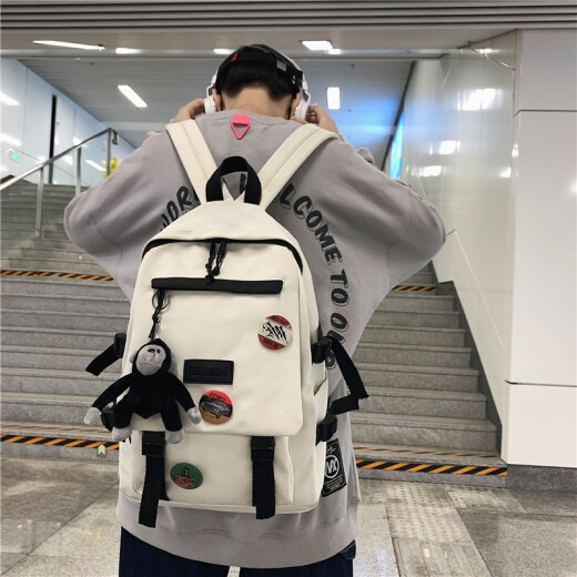 Japanese and Korean fashion trend small capacity travel backpack boys backpack leisure sports campus versatile couple school bag male junior high school college student 15-inch computer bag Xiulong new white