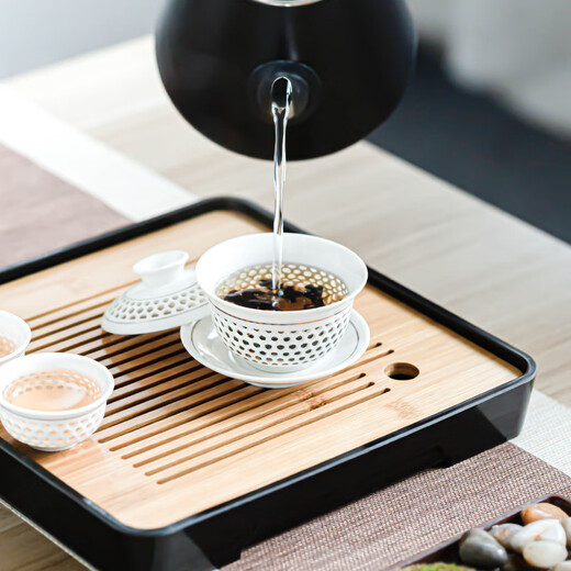 Craftsman's exquisite ceramic tea set complete set of honeycomb hollow tureen simple household kung fu small teapot office tea cup set <Sunflower> 10-piece tureen set