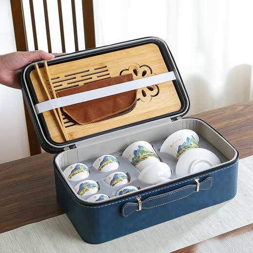 Three more than nine such as Kung Fu tea set complete gift box to give away mutton-fat jade tea set high-end travel tea tray teacup cover bowl integrated mutton-fat jade tea set blue leather bag
