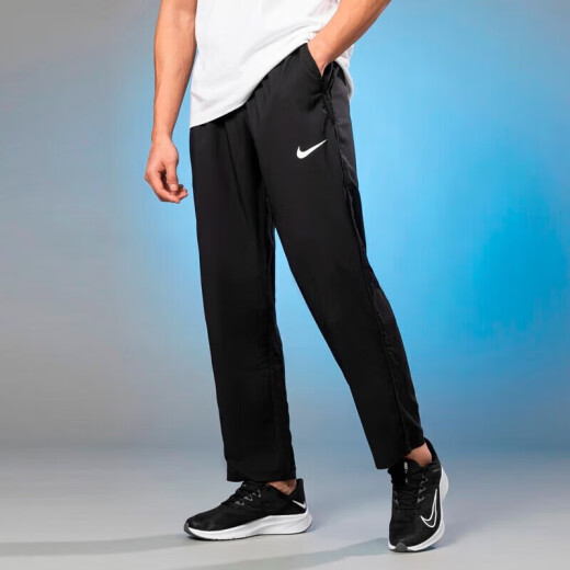 Nike (Nike) Pantalones de hombres oficiales 2025 Pantalones deportivos Nuevos pantalones de secado rápido de moda transpirable Moda de moda suelta DM6627-010 XL [180-185cm/150-160Jin [Jin iguala 0.5 kg]]