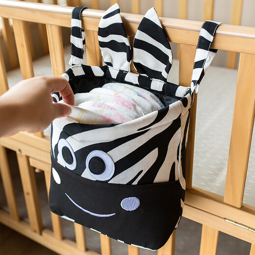 Yusenyi Crib Zaun Hanging Bag Kinder am Nachtbett Aufbewahrungskorb Hängende Beutel Dreidimensional geschnittene Wickeltasche Süßes Zebragürtel wurde in Schwarz geändert