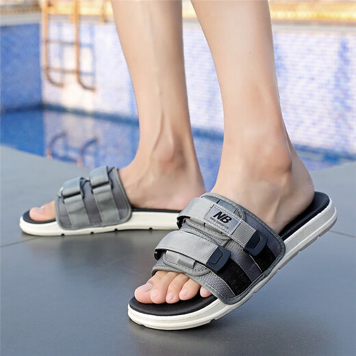 New Balance Sitio web oficial 2025 primavera y verano zapatillas de playa New Beach hombres y mujeres pareja casual Velcro Flip Flip 1050 Negro 43