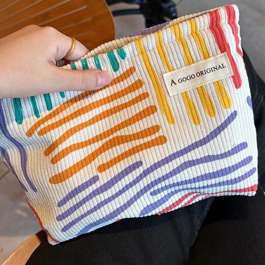 Ins niche canvas bag contrasting color striped cosmetic bag portable travel business trip skin care product storage bag wash bag colorful striped cosmetic bag
