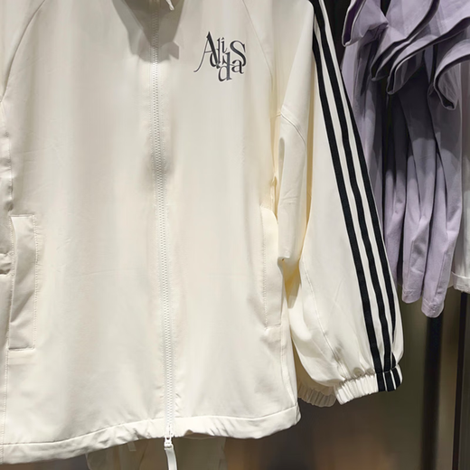 Adidas Clover Coat Frauen Frühling 2025 Neue lose Casual Sportswear Stand Halsband Wobdes Windschutzjacke auf JI9768 Han Yu White M.