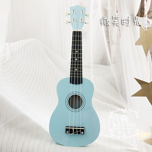 Han Qinxia Bébé bleu petit ukulélé frais uklili hawaïen quatre cordes débutantes petite guitare 23 pouces bleu clair + pick + cordes de remplacement + tutoriel