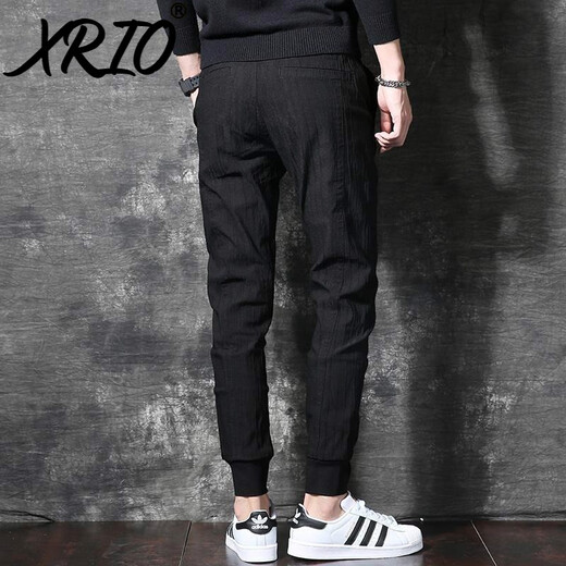 Pantalons décontractés de Xrio Men's Men's Fleece Automne et hiver Nouveau pantalon épaissi des pantalons coréens de style coréen.