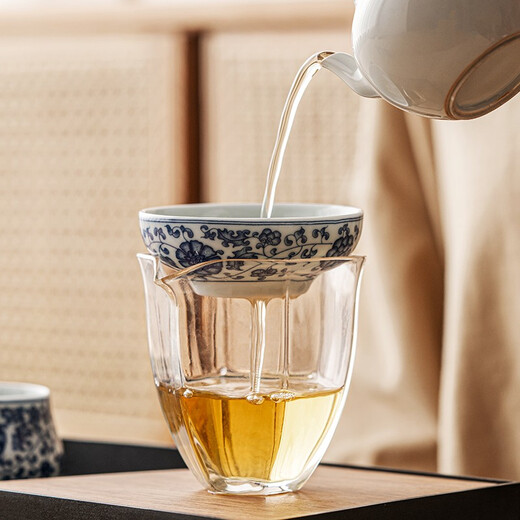 Tangfeng all-ceramic one-piece tea drain blue and white filter household ceramic kung fu hand tea partition simple tea filter blue and white lotus tea drain
