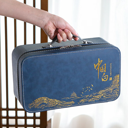 Three more than nine such as Kung Fu tea set complete gift box to give away mutton-fat jade tea set high-end travel tea tray teacup cover bowl integrated mutton-fat jade tea set blue leather bag