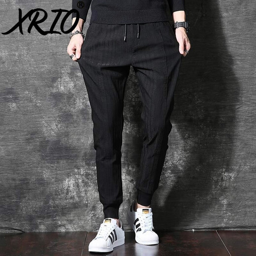 Pantalons décontractés de Xrio Men's Men's Fleece Automne et hiver Nouveau pantalon épaissi des pantalons coréens de style coréen.