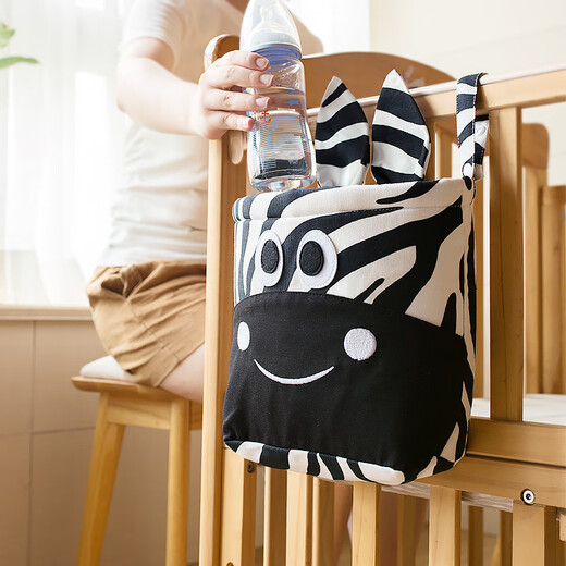 Yusenyi Crib Zaun Hanging Bag Kinder am Nachtbett Aufbewahrungskorb Hängende Beutel Dreidimensional geschnittene Wickeltasche Süßes Zebragürtel wurde in Schwarz geändert