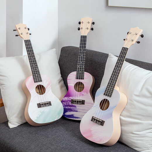 Hochwertige Ukulele-Anfänger, erwachsene weibliche und männliche Internet-Berühmtheit können kleine Gitarre 23-Zoll-Graffiti Purple Paket zwei spielen