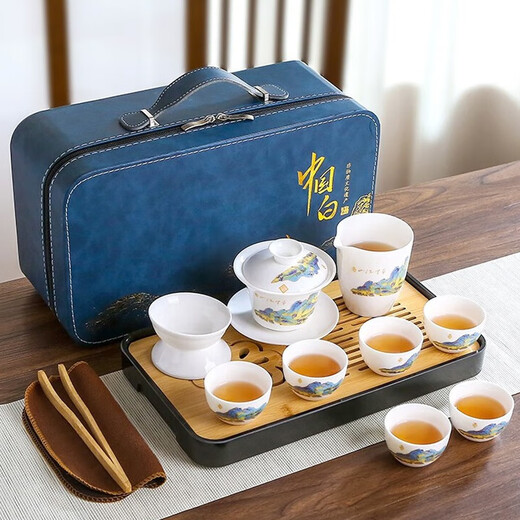 Three more than nine such as Kung Fu tea set complete gift box to give away mutton-fat jade tea set high-end travel tea tray teacup cover bowl integrated mutton-fat jade tea set blue leather bag