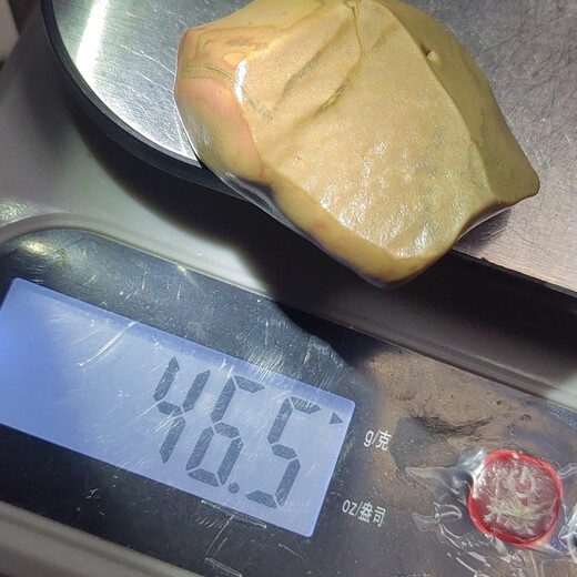 Xinjiang Hami Nanhu Laokeng clinker jade colored mudstone boutique handle piece 46.6 grams.