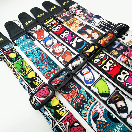 Quyang Gitarrengurt Cartoon Männer und Frauen klassischer Stil personalisierter Volkslied Bakelite Gitarrengurt Ukulele Schultergurt Universal Britische Zeitung Schwanz Nagel + 2 Picks
