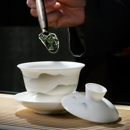 Qixuanyuan mutton fat jade porcelain Kung Fu tea set home high-end office reception guest ink Jiangshan tea cup cover bowl complete set