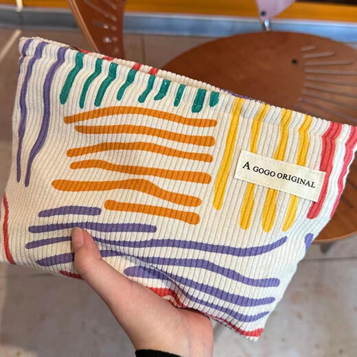 Ins niche canvas bag contrasting color striped cosmetic bag portable travel business trip skin care product storage bag wash bag colorful striped cosmetic bag