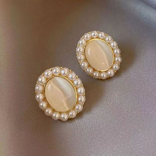 S925 silver needle cat's eye pearl earrings for women niche design earrings 2023 new light luxury earrings main picture