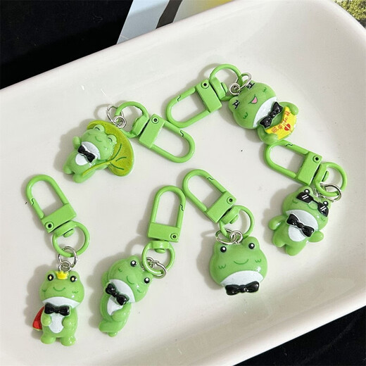 Mini Lonely Frog Schlüsselbund Anhänger Geheimnis, um aus Singlety lustig Cartoon Anhänger bester Freund Geschenk kleiner Ornament [Zufallsstil] 1 Pack