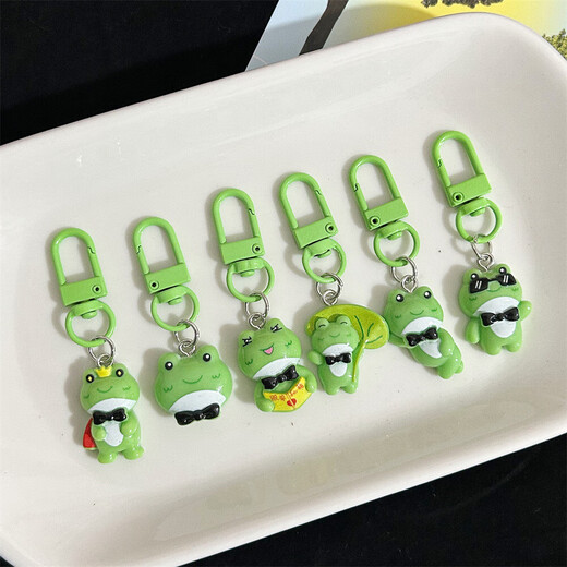 Mini Lonely Frog Schlüsselbund Anhänger Geheimnis, um aus Singlety lustig Cartoon Anhänger bester Freund Geschenk kleiner Ornament [Zufallsstil] 1 Pack