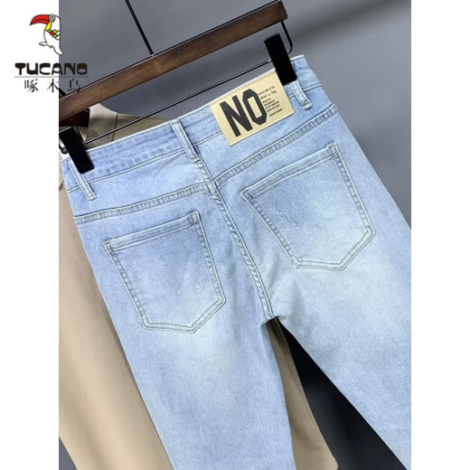 
Woodpecker (TUCANO) nine-point jeans men's summer thin 2025 Korean version versatile light blue stretch versatile slim fit pants new product 9922 dark blue 28