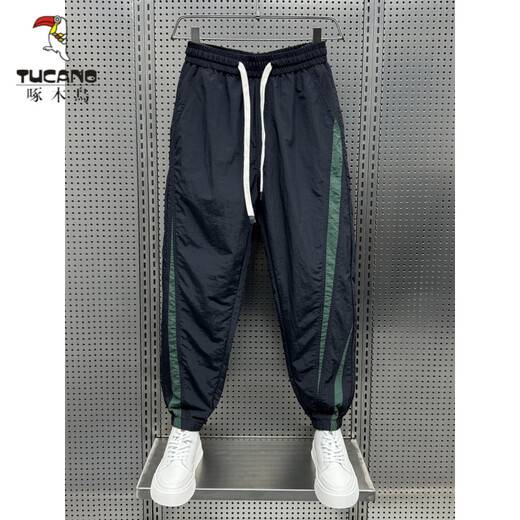 Woodpecker (Tucano) Summer Ice Ice Silk Pantalon décontracté épissé de neuf points pour adolescents Pantalons Harem Brand de sport à séchage rapide Men de sport
