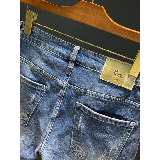 Qianji (Qianji) Rastros pantalones cortos de mezclilla de mezclilla para hombres Pantalones de cinco puntos delgados de cinco puntos