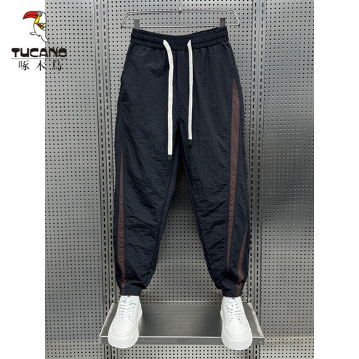 Woodpecker (Tucano) Summer Ice Ice Silk Pantalon décontracté épissé de neuf points pour adolescents Pantalons Harem Brand de sport à séchage rapide Men de sport