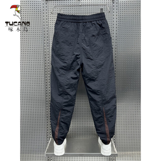 Woodpecker (Tucano) Summer Ice Ice Silk Pantalon décontracté épissé de neuf points pour adolescents Pantalons Harem Brand de sport à séchage rapide Men de sport