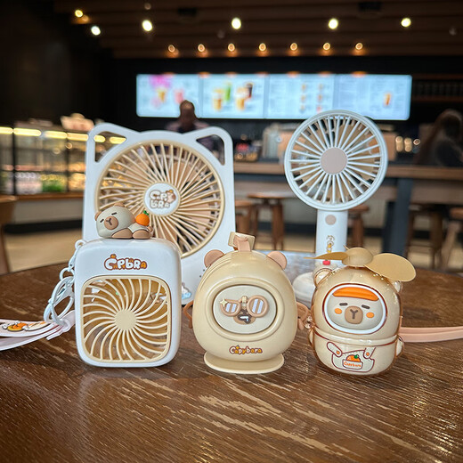 IZW2025 cute Kapibala fan with high appearance and convenient handheld outdoor mini USB charging small fan 9221K See details