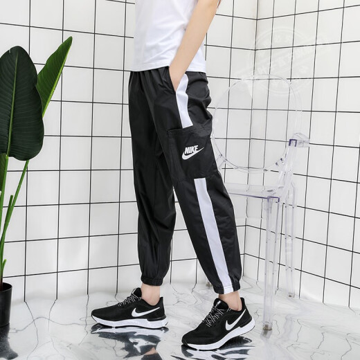Nike (Nike) Frauensportanzug 2025 Spring Neue Modetrendwindproof Jacke Lose Hosen DM6180-010+CJ7347-010 XL
