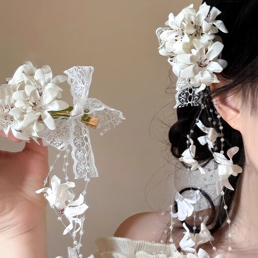 Dai Yan new Chinese style lily of the valley flower hairpin 2025 new simulated flower hairpin side clip vacation photo atmosphere headwear flower tassel side clip single