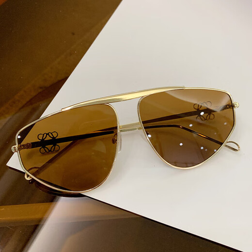 Nuevas gafas de sol de metal para mujeres Gafas de sol de diseño de gafas huecas en marco de protección solar de hombres europeos y americanos Gafas conductoras 9898 Peacock azul
