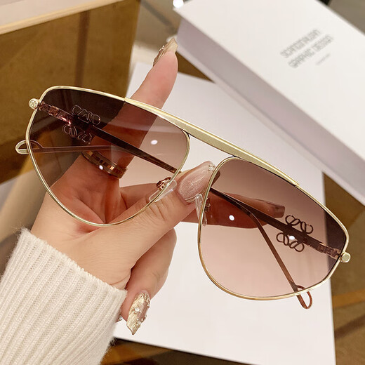 Nuevas gafas de sol de metal para mujeres Gafas de sol de diseño de gafas huecas en marco de protección solar de hombres europeos y americanos Gafas conductoras 9898 Peacock azul