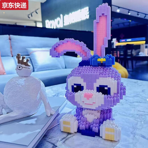 Qili Cai Chaole Sen versammelte kleine Partikel Spielzeug Stern Dailu Rabbit Building Blocks Jungen und Mädchen stellen Stände mit hohem Schwierigkeitsgrad Soziales Kaninchen LS6169+ Bausteinhammer auf
