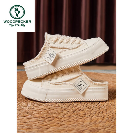 Luz de carpintero Luz de lujo Versátiles Versátiles de lienzo semi-Torchado para mujeres 2025 Nuevo ropa de primavera y verano y use zapatos blancos perezosos para un pie beige 35