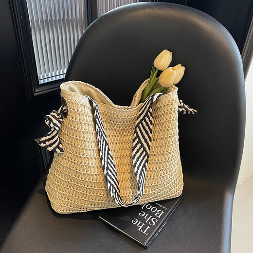 Bolsa tejida de paja de estilo perezoso para mujeres en verano 2025 New Seaside Vacation Bags Versátil