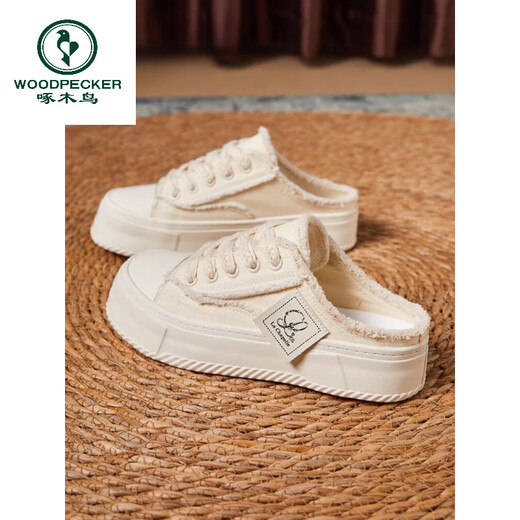 Luz de carpintero Luz de lujo Versátiles Versátiles de lienzo semi-Torchado para mujeres 2025 Nuevo ropa de primavera y verano y use zapatos blancos perezosos para un pie beige 35