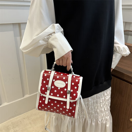 Collège mignon sac à dos 2025 Nouveau style de mode portable portable à pois sac à dos sac à dos sac à bandoulière femmes bac crossbody rouge
