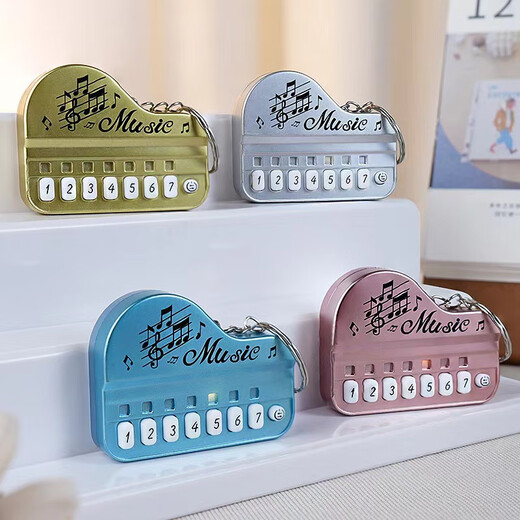 Enérgica Fun Class Fun Fishing Pequeños juguetes creativos Mini Electronic Electronic Piano Keychain colgante de colgante brillante Macaron en polvo