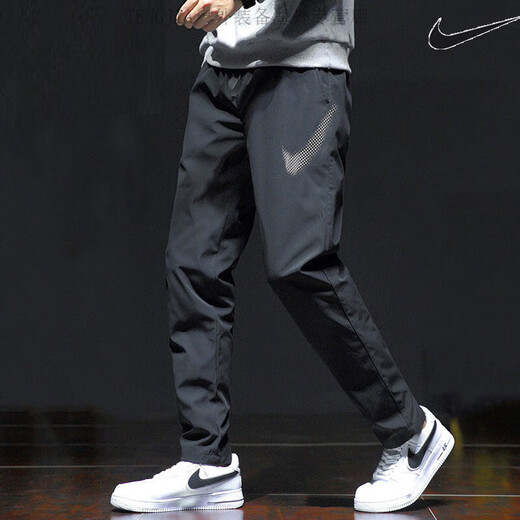 Nike (Nike) Seda de seda de hielo Pantalones de chándal de secado rápido para pantalones casuales de pie pequeño cónico para hombres Pantalones de entrenamiento transpirables en transpirable Negro/DM6627-010 Pantalones rectos M120-130Jin [Jin equivale a 0.5 kg]