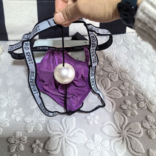 He Jiagong men's underwear with 4 cm big beads hanging on the back, personalized play style, sexy thong, transparent butt-exposing macho underwear, transvestite, black