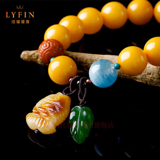 La Yun Feiyin Baltic Sea beeswax bracelet natural amber chicken fat yellow round bead bracelet beeswax fish pendant with jasper jade leaves Type A fish with jasper jade leaves