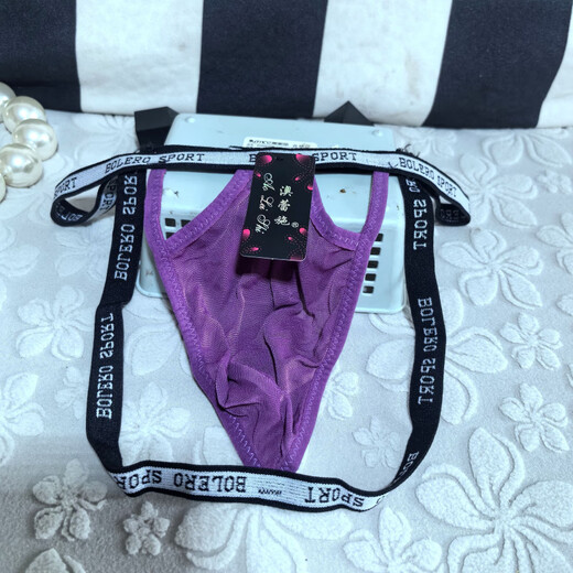 He Jiagong men's underwear with 4 cm big beads hanging on the back, personalized play style, sexy thong, transparent butt-exposing macho underwear, transvestite, black
